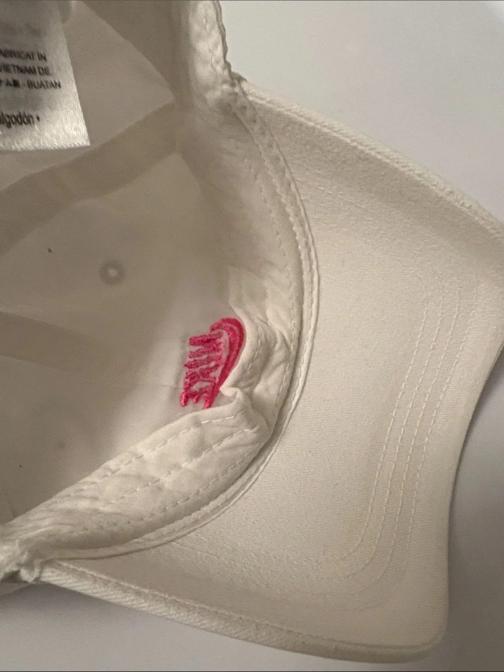 Nike White Baseball Cap with Pink Swoosh